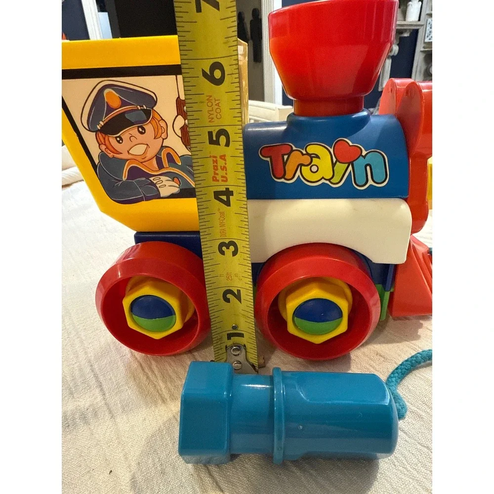 Vintage Take Apart Pull Along Toy Train with Wrench Tool Colors Conductor
